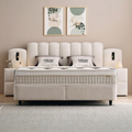 Dream Boxspringbett Frontansicht in Beige mit Stoffbezug, gepolstertem Kopfteil, Matratze und Topper im hellen Schlafzimmer