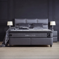Hamilton Boxspringbett in Webstoff Grau als Frontansicht im eleganten Schlafzimmer mit Kopfteil und Matratze