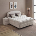 Fancy Boxspringbett Beige aus Samt Velours in Seitenperspektive, Matratze mit Topper und gepolstertes Kopfteil im Wohnraum