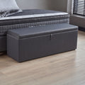Bettbank in Webstoff Grau als Stauraum am Fussende des Hamilton Boxspringbett mit Matratze im Hintergrund