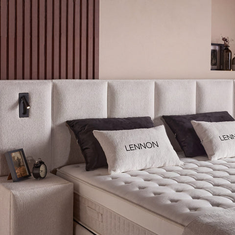 Lennon Boxspringbett Detail: gestepptes Kopfteil in Bouclé Beige mit Topper-Matratze und Lennon-Kissen