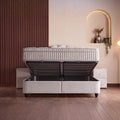 Cali Boxspringbett mit geöffnetem Bettkasten von vorne, Samt Velours Beige und viel Stauraum unter der angehobenen Matratze