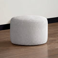 Runder Bouclé Hocker in Creme passend zum Claudi Boxspringbett, weiche Polsterung als Sitzmöbel